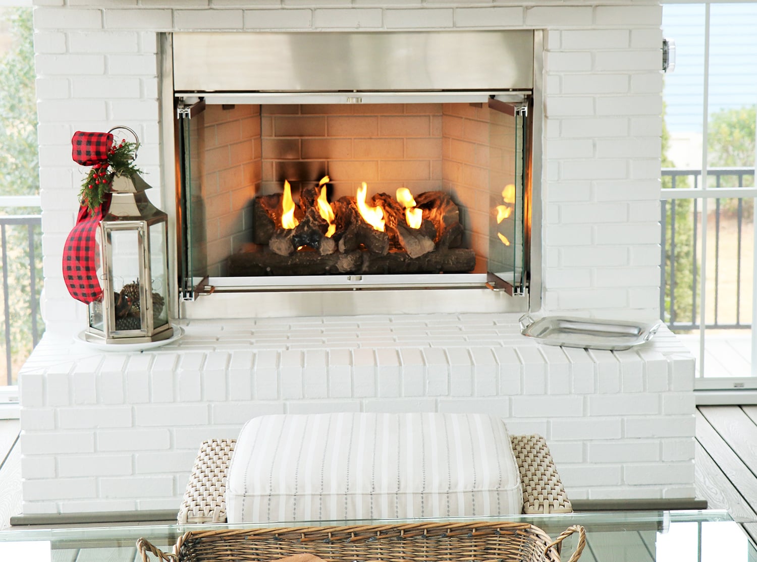 Custom stone fireplace below a tongue-and-groove ceiling